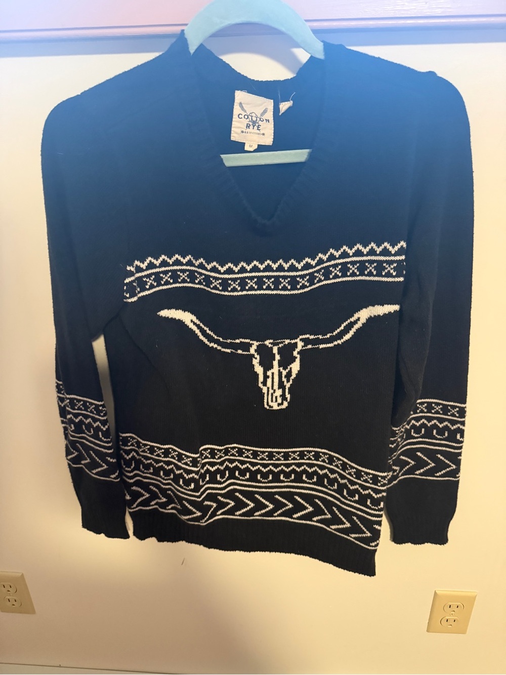 Long horn black sweater